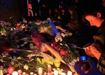 Flowers and candles after a series of deadly attacks in Paris