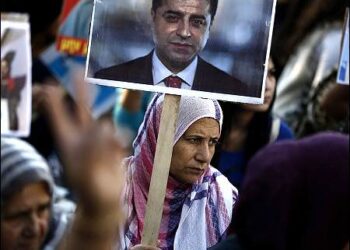 A Kurdish protester holds the photo of Selahattin Demirtas during a demonstration against the Turkish government following the arrests of leading Kurdish politicians in Turkey, Nov. 2016. Photo: EPA