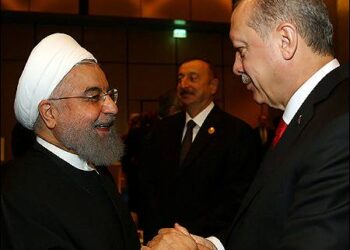 Turkish President Recep Tayyip Erdogan (R) shakes hands with his Iranian counterpart Hassan Rouhani, Azerbaijan president Ilham Aliyev (C), Ankara, 2017. Photo: Reuters