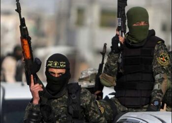 Arab Palestinian Islamic Jihad militants ride in a pickup truck as they celebrate the release of Islamic Jihad member Tarek al-Mudalal from an Israeli jail, in Rafah, in the southern Gaza Strip, January 18, 2018. Photo: Reuters