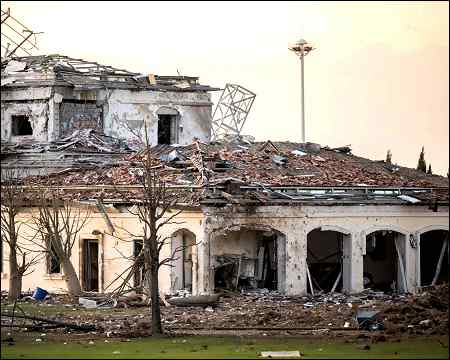A damaged building own by Sheikh Baz, and Kar oil-company
