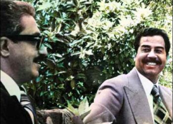 The old days...Saddam Hussein (R) with Tariq Aziz. Photo: ISF