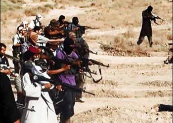 Islamic State (ISIS) militants fire on a group of Iraqi Shiite soldiers, aka Speicher massacre, Iraq, June 2014. Photo: IS media video/via AP