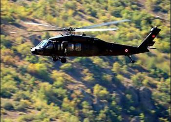 NOT USED A Turkish military helicopter flying over the Kurdish region in southeastern  Turkey, 2017. Photo: AFP
