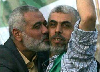 Hamas leader Ismail Haniyeh (L) kisses Yahya Sinwar after Sinwar’s release from Israeli prison in a prisoner exchange deal in October 2011. The deal, known as the Gilad Shalit deal. Photo: Arab Networks