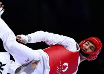 Iranian Kurdish athlete Arian Salimi wins Taekwondo gold at the Paris Olympics, August 10, 2024. Photo: Reuters