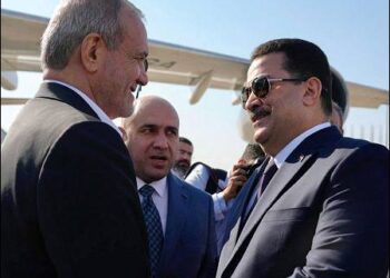 Mohammed Shia al-Sudani with Masoud Pezeshkian
