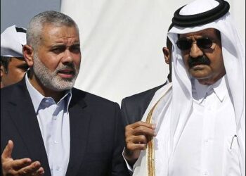 Then-Emir of Qatar Sheikh Hamad bin Khalifa al-Thani (right) with then Gaza's Hamas Prime Minister Ismail Haniyeh during the Emir's visit to Gaza on October 23, 2012. Photo: AP