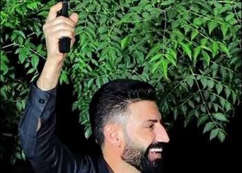 Amanj Hasan Zada, an Iranian Kurdish migrant smuggler, fires a gun at a party. On November 8, 2024, he was sentenced to 17 years in a UK prison.
Photo: Video/SM/via iKurd.net
