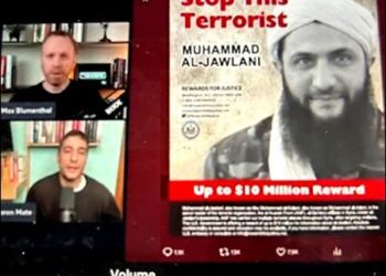 Abu Mohammed al-Golani (right), the leader of Syrian Islamist radical group Hayat Tahrir al-Sham (HTS), formerly known as Al Nusra affiliated with al-Qaeda. Photo:  The Grayzone/YouTube channel/iKurd.net
