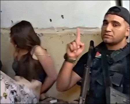 Israeli woman hostage with hamas militants, Gaza