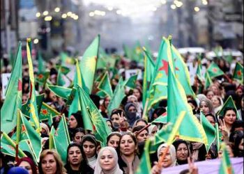 Women wave Women's Protection Units (YPJ) flags during a rally in Qamishlo, Syrian Kurdistan (Rojava), on December 23, 2024. The rally called on the Syria's new Islamist rulers in Damascus to respect women's rights and condemn Turkish-backed military campaigns in Kurdish regions of northern Syria, December 23, 2024. Photo: Reuters