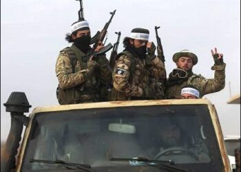 Turkey-backed Syrian Islamic mercenary militants ride in a truck in Talhiya, Idlib countryside, Syria, November 29, 2024. Photo: AP
