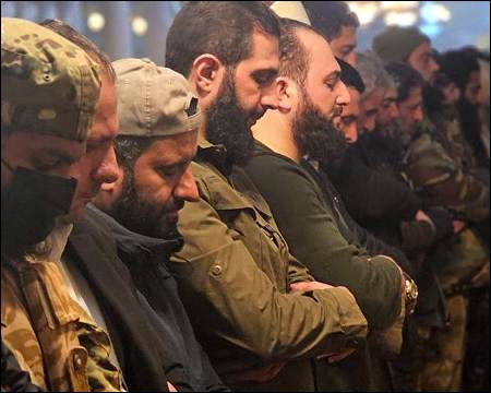 Syria keeps central role for Islamic law in constitutional declaration