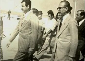 Mukarram Talabani, a prominent Iraqi Kurdish politician, writer, and mediator (right) with former Iraqi president Saddam Hussein, late 1970s. Photo: Talabani's Archive