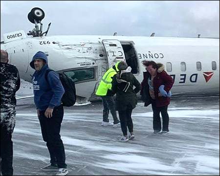 Delta airlines plane flips over during landing in Toronto