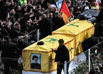 A vehicle carries the coffins of former Hezbollah leaders Hassan Nasrallah and Hashem Safieddine, who were killed in Israeli airstrikes in 2024, during a public funeral ceremony, in Camille Chamoun Sports City Stadium, on the outskirts of Beirut, Lebanon February 23, 2025. Photo: Reuters