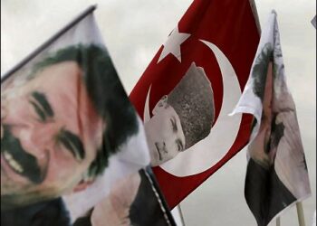 HDP supporters wave a flag with Turkish Republic's founder Mustafa Kemal Ataturk, and others of jailed Kurdish leader Abdullah Ocalan, in Istanbul, 2015. Photo: AP
