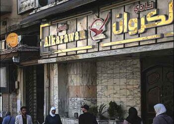 The closed entrance of al-Karawan nightclub, which was attacked by gunmen overnight, on Damascus' Saadallah al-Jabri street on May 5, 2025. Photo: AFP