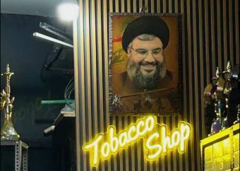 Hezbollah leader Hassan Nasrallah poster at a Tobacco shop in Beirut, Lebanon, March 17, 2025. Photo: Sheri Laizer/via iKurd.net