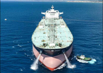 The crude oil tanker Nissos Christiana, first ship to transport oil from Syria since the fall of Bashar al-Assad’s regime, anchored in the port of Tartus, Syria, September 1, 2025. Photo: iKurd.net. The original photograph from Reuters was altered using AI.