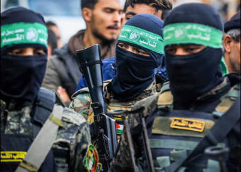 Members of the Al-Qassam Brigades, the military wing of radical Islamist Hamas froup, attend the funeral of the bodies of Al-Qassam fighters who were killed during the Israeli war on Gaza, 2025. Photo: Flash90