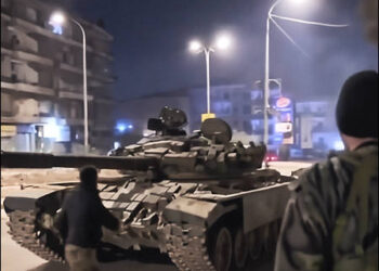 Syrian government-aligned Islamist militias launched attacks using tanks and heavy weapons on the Kurdish neighborhoods of Sheikh Maqsoud and Ashrafieh in Aleppo, Syria, December 22, 2025. Photo: Screenshot from Al Hadath TV.