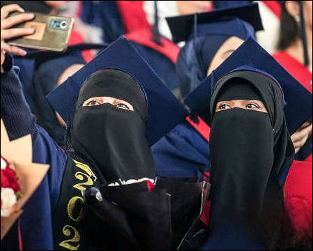 Women graduates of a polytechnic university in Sulaimani wearing Salafi niqab associated with Radical Islam