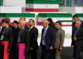 Iranian religious leaders and other mourners walk past the coffins of slain Iranian Supreme Leader Ayatollah Ali Khamenei and members of his family during a viewing ceremony ahead of the dayslong funeral ceremonies at the Imam Khomeini Mosalla Grand Mosque in Tehran, Iran, July 3, 2026.Photo: AP