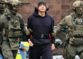 Police escort Serhii K. from a helicopter before a hearing with the German Federal Public Prosecutor in Karlsruhe, Germany, November 27, 2025, after Italy's top court has approved the handover to Germany of the Ukrainian man, suspected of coordinating the 2022 sabotage of the Nord Stream gas pipeline. Photo: EPA