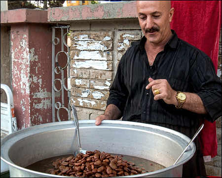 Faruq Sabr, a famous bean seller (Paqle Frosh) in Sulaimani city, Iraqi Kurdistan