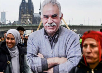 Kurdish demonstrators carry an image of PKK founder Abdullah Ocalan, Germany, 2025. Photo: AFP