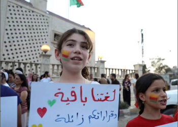 Kurdish girl school sign language Qamishlo Syrian Kurdistan Rojava Aug 31, 2026