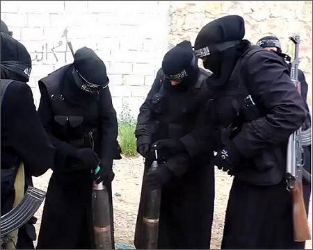Niqab-wearing female ISIS fighters in Raqqa, Syria, from the Khansa Battalion