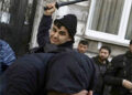 Turkish police security officer beat Kurdish protesters Istanbul Nov 5, 2016